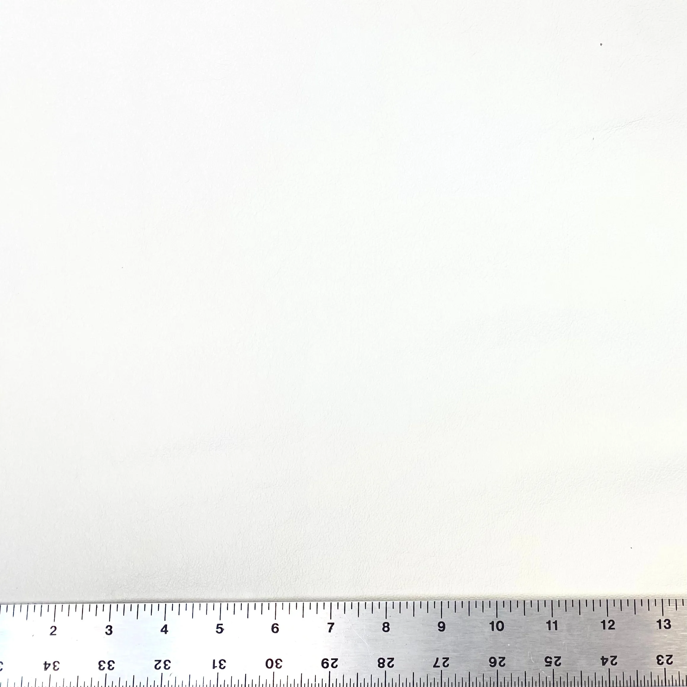 3oz (1.2mm) Firm Flat Grain Cow Leather - White (per square foot)